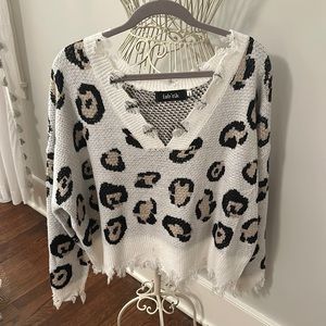 Distressed fab’rik sweater